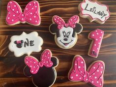 some decorated cookies with minnie mouse on them