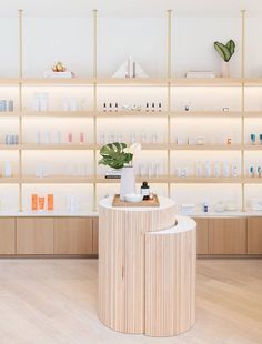 the inside of a store with shelves filled with cosmetics and personal care products on display