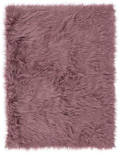 a pink rug with shaggy fur on it's sides and a square shape in the middle