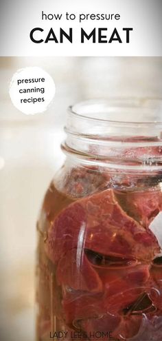 a jar filled with meat sitting on top of a table