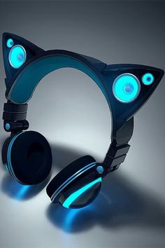 a pair of headphones with cat ears and glowing eyes are shown in this image