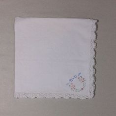 a white handkerchief with small flowers on it