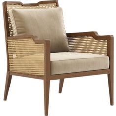 a chair that is made out of wicker and has a beige cushion on it