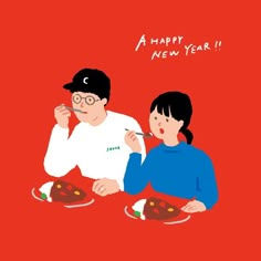 a man and woman are sitting at a table eating cake with the words happy new year written on it