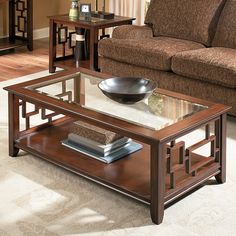 a living room filled with furniture and a coffee table