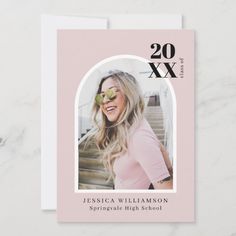 a pink graduation announcement card with a photo