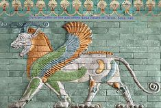 a decorative wall with a lion painted on it's side and an inscription below