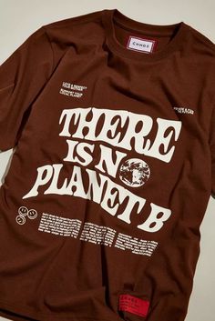 there is no planet t - shirt in brown with white print on the front and back