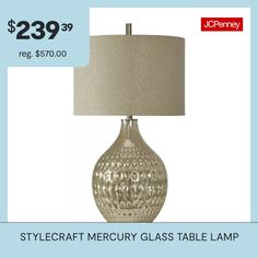 a table lamp with a price tag for $ 29 99 reg $ 37 00 and up