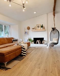 a living room filled with furniture and a fire place