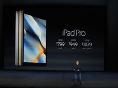 steve jobs standing in front of an apple product on stage with the new iphone pro