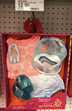 an assortment of baby items are displayed in a toy store's display case for sale