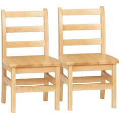 two wooden chairs sitting next to each other