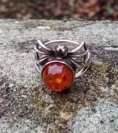 Vintage natural amber and sterling silver spider ring, Statement ring, Unusual silver jewellery Material: 925 sterling silver (hallmarked 925 on the inside near the head of the spider) Natural amber Size: M 1/2  (UK) ; 6.5 (US) Condition: good, no damage Spider Rings, Spider Ring, Rings Art Deco, Poison Ring, Natural Amber, The Spider, Silver Jewellery, Rings Statement, Statement Ring