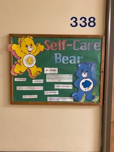 there is a sign on the wall that says self - care bear and two teddy bears