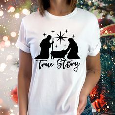 Christian T shirt with a Nativity Scene in all black and the words True Story.   This Christmas t shirt is sure to be a favorite with friends and family. Holiday Black T-shirt With Letter Print, Christmas Tee Shirts, Church Shirt, Christmas Nativity Scene, Christian T Shirt, Nativity Scene, Christmas T Shirt, Christmas Tees, Disney Gifts