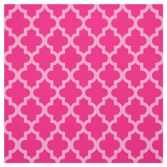 a pink rug with white links on it