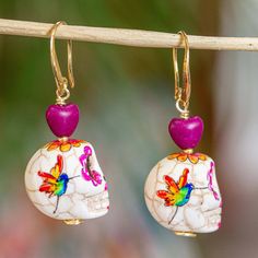 Painted lovingly by hand marble skull earrings are the perfect accessory for Day of the Dead or anytime at all. Josefina and Cecilia in Mexico craft the earrings by hand adding fuchsia reconstituted turquoise hearts and 14k gold plated brass hooks. Mexico Crafts, Turquoise Heart, Skull Bracelet, Skull Necklace, Skull Jewelry, Skull Earrings, Skull Ring, Fall Jewelry, Artisan Craft