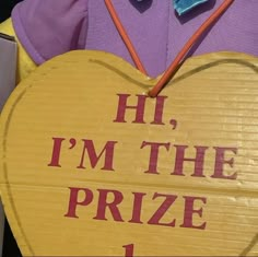 a wooden sign that says hi, i'm the prize