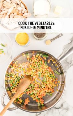 a pan filled with vegetables on top of a counter next to other food items and the words, cook the vegetables for 10 - 15 minutes