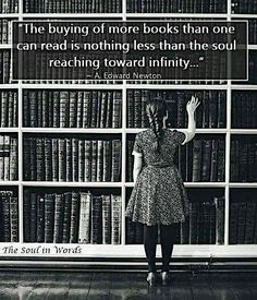 a woman standing in front of a bookshelf with a quote from edward newton