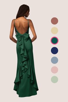 This stretch satin floor length dress features a straight neckline, adjustable spaghetti straps, a bow back, a ruffle design, and a mermaid skirt. Fitted Prom Gown With Bow Tie Back, Tiana Blue Dress, Peacock Color Dress, Teal Prom Dresses, Prom Trends, Dark Green Bridesmaid Dress, Dark Navy Bridesmaid Dresses, Navy Bridesmaid Dresses, Ruffle Design