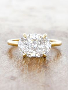 caption:Shown with 2.7ct oval diamond Oval Diamond Settings, Gold Band Engagement Rings, Oval Solitaire Engagement Ring, Unique Diamond Rings, Oval Rings, Jewelry Lookbook, Engagement Rings Oval, Oval Cut Diamond, East West