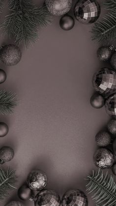 christmas balls and fir tree branches in black and white