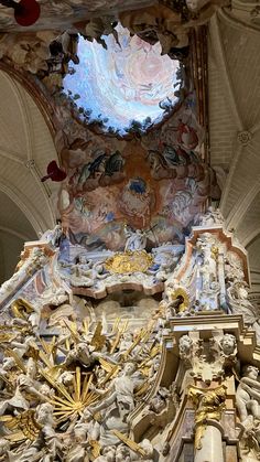 an elaborately decorated ceiling in a church