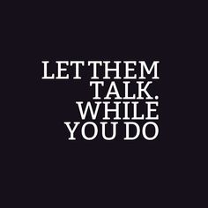 the words let them talk while you do are in white on a black background,