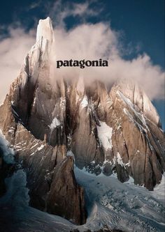 the top of a mountain covered in snow and clouds with the word patagonia above it