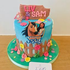 a birthday cake with a horse on top and the words i love sam written on it