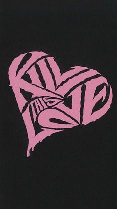 a black and pink heart with zebra print on the side, in front of a black background