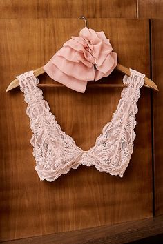 Made for every day, this lace bralette is featured in a pull-on style and sheer fabrication with a plunging neckline and low back. **Fit:** Pull-on style **Features:** Sheer lace fabrication, scallop trim, plunging neckline, fixed shoulder straps, low back, side boning for a supportive fit **Why We | Last Dance Lace Plunge Bralette by Intimately at Free People in Pink, Size: L Party Lace Bra With Low-cut Design, Feminine Lace With Built-in Bra, Feminine Delicate Lace Bra For Party, Lace Bodice Bra For Weddings, Feminine Stretch Lace Bra, Delicate Lace Low-cut Feminine Bra, Feminine Delicate Lace Low-cut Bra, Chic Lace Bra With Lace Trim, Chic Lace Bra With Lace Closure