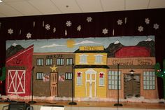 a decorated wall in an office building with christmas decorations on the front and side walls