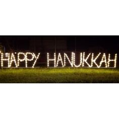 happy hanukkah lighted sign in the grass