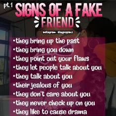 a woman with pink hair is looking at her phone and has the words signs of a fake friend on it