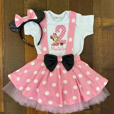 minnie mouse birthday outfit with headband and ears on wooden floor, ready to be worn