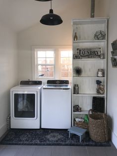 a washer and dryer in a small room