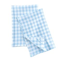 two blue and white checkered napkins on top of each other