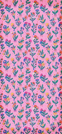 a pink wallpaper with colorful flowers and plants on the bottom, in different colors