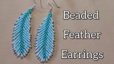 the beaded feather earrings are made with blue seed beads and silver earwires