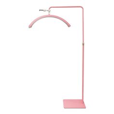 a pink floor lamp on a white background