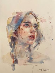 a watercolor painting of a woman's face