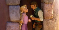 the princess and the frog are talking to each other in front of a stone wall