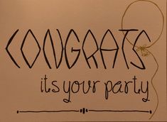 a handwritten sign that says congrats it's your party on the wall