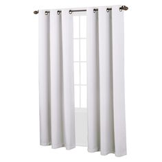 white curtains hanging on the side of a window