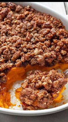 a close up of a pie in a pan on a table