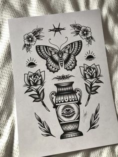 a drawing of a vase with flowers and butterflies on it's face next to a butterfly