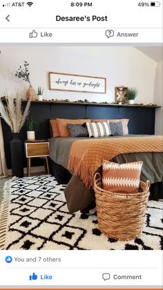 a bedroom with a bed, rug and pillows on the bottom floor is shown in an instagram